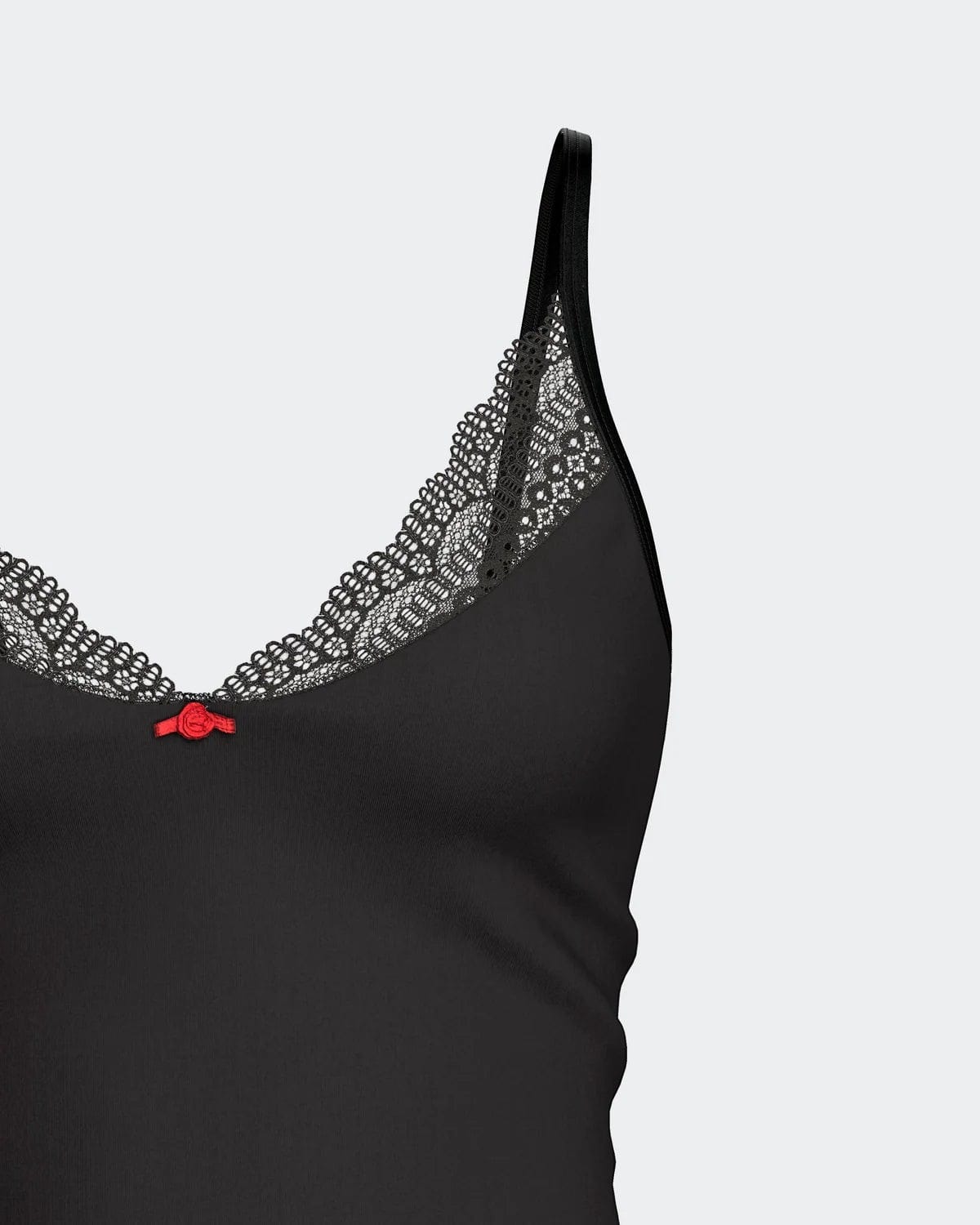 Maison Sarava black camisole with lace trim and red bow detail, made from TENCEL™ Lyocell.