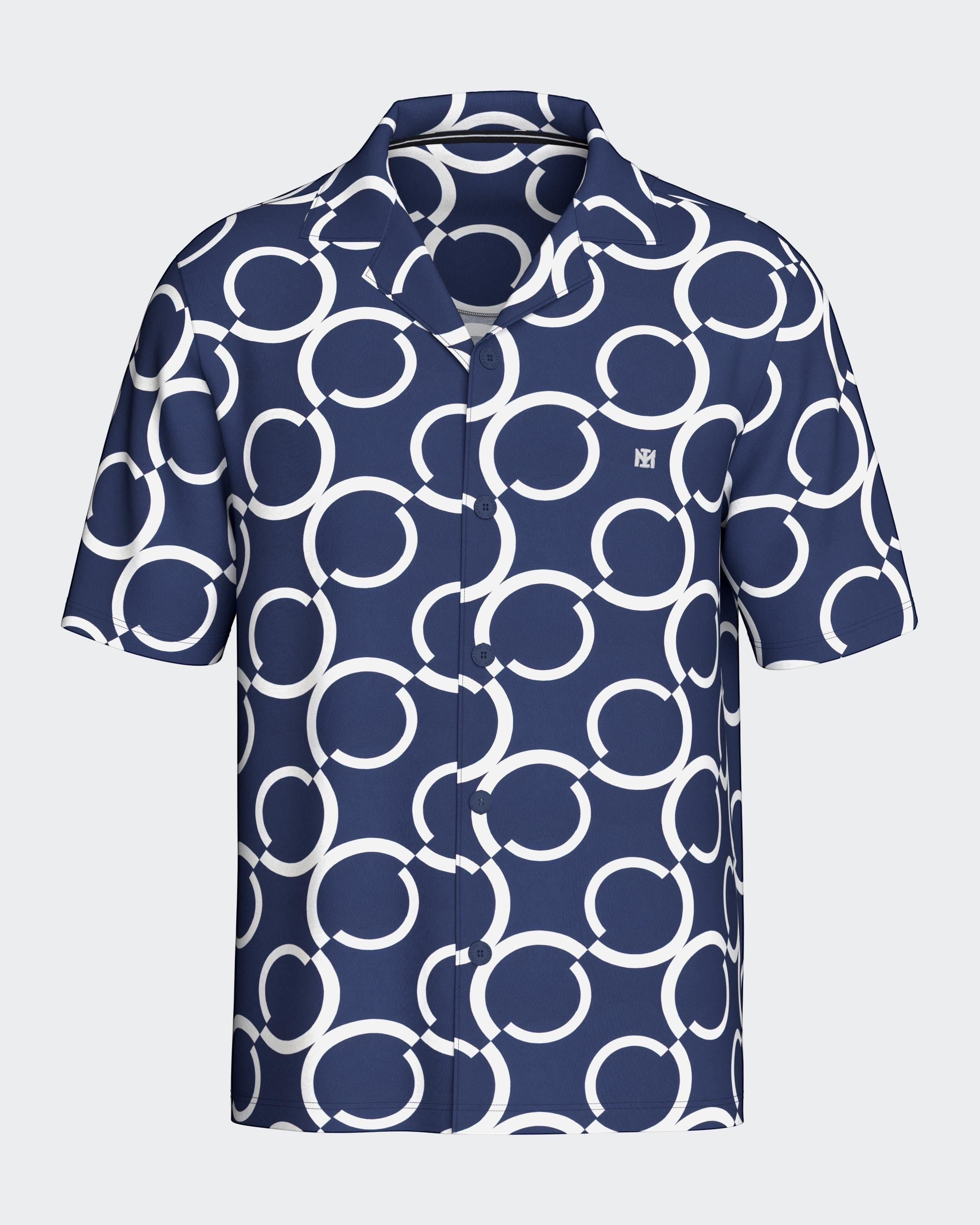 Maison Sarava navy and white geometric print short sleeve resort shirt with open collar.