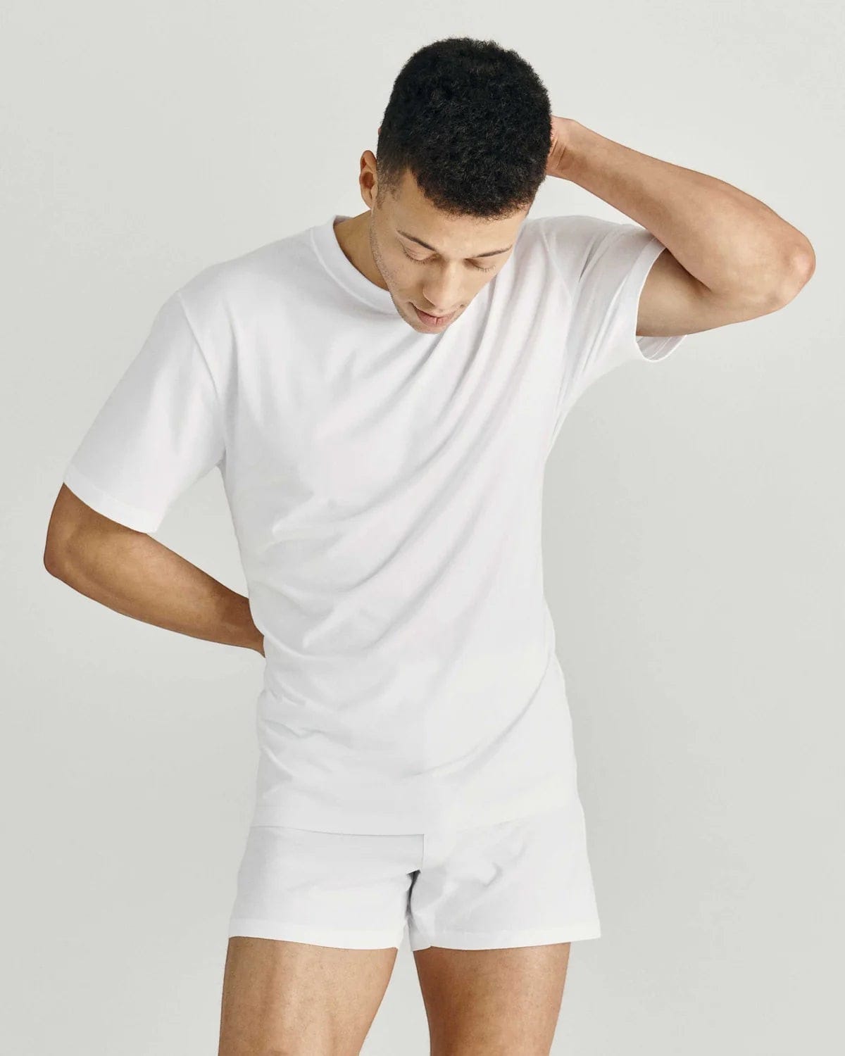 Maison Sarava white cotton crew neck t-shirt with short sleeves on a man.