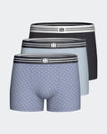 Maison Sarava pack of 3 men's cotton boxers: one blue with micro logo pattern, one light blue, one black. Comfortable elastic waistband.