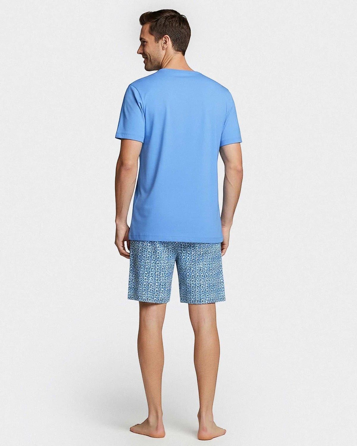 Maison Sarava men's blue 100% cotton short sleeve lounge set with geometric print shorts and two-button placket top.
