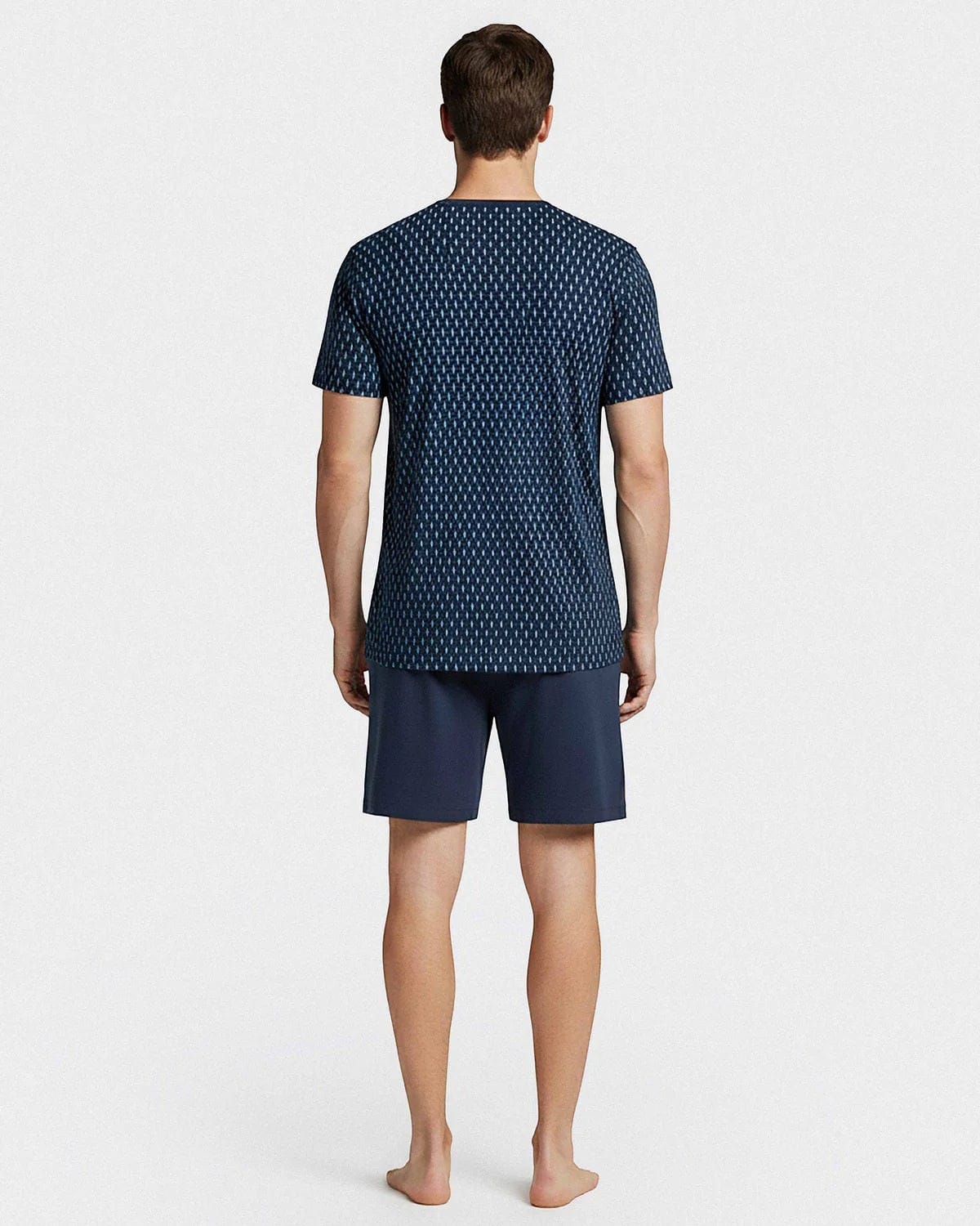 Maison Sarava men's navy blue cotton short sleeve lounge set with a geometric pattern on the t-shirt and solid navy shorts.