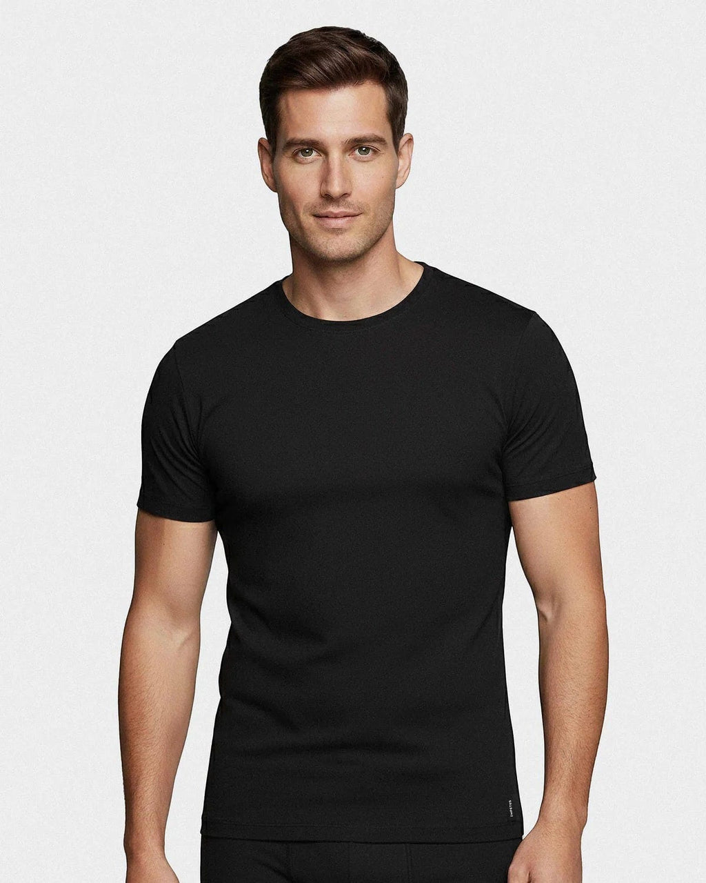 Maison Sarava black cotton crew neck t-shirt on a man. Short sleeves, slim fit.