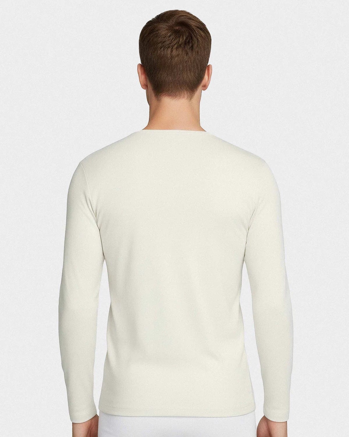 Maison Sarava men's cream long-sleeved V-neck t-shirt made from premium Merino wool and Lyocell for thermal regulation and breathability.
