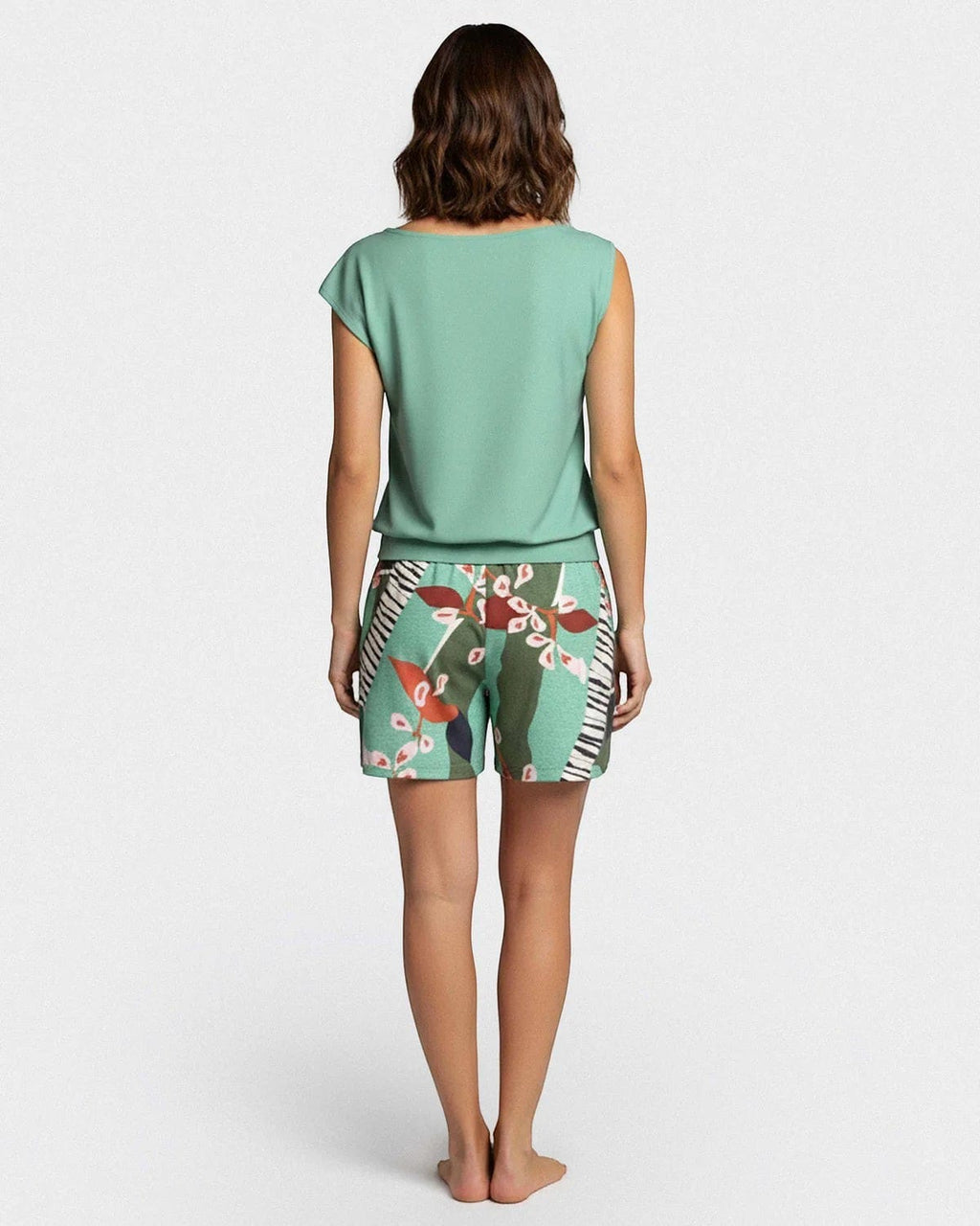 Maison Sarava women's mint green modal short sleeve lounge set with botanical print shorts and draped shoulder top.