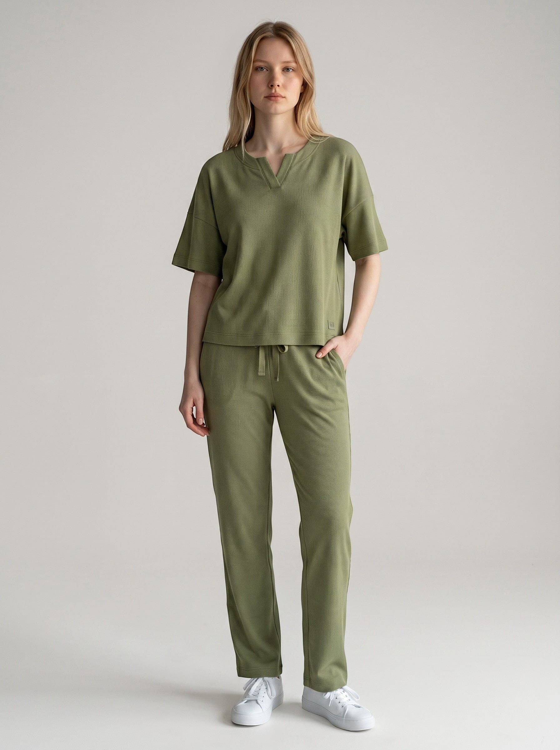 Maison Sarava women's olive green lyocell lounge set with v-neck top and drawstring pants.