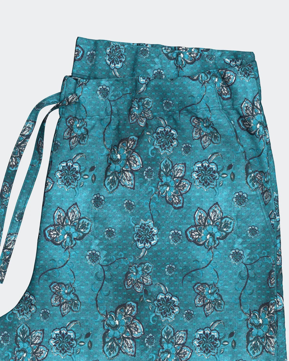 Maison Sarava aqua green lyocell lounge set with tropical floral print, lapel collar shirt and drawstring shorts.