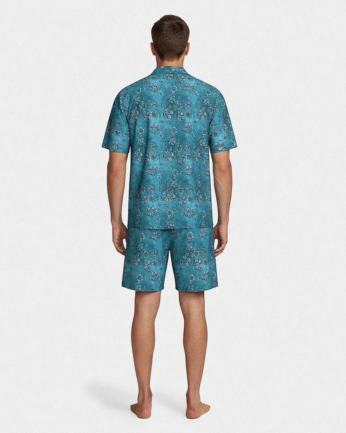 Maison Sarava men's aqua green lyocell lounge set with floral print. Short-sleeved shirt and shorts.
