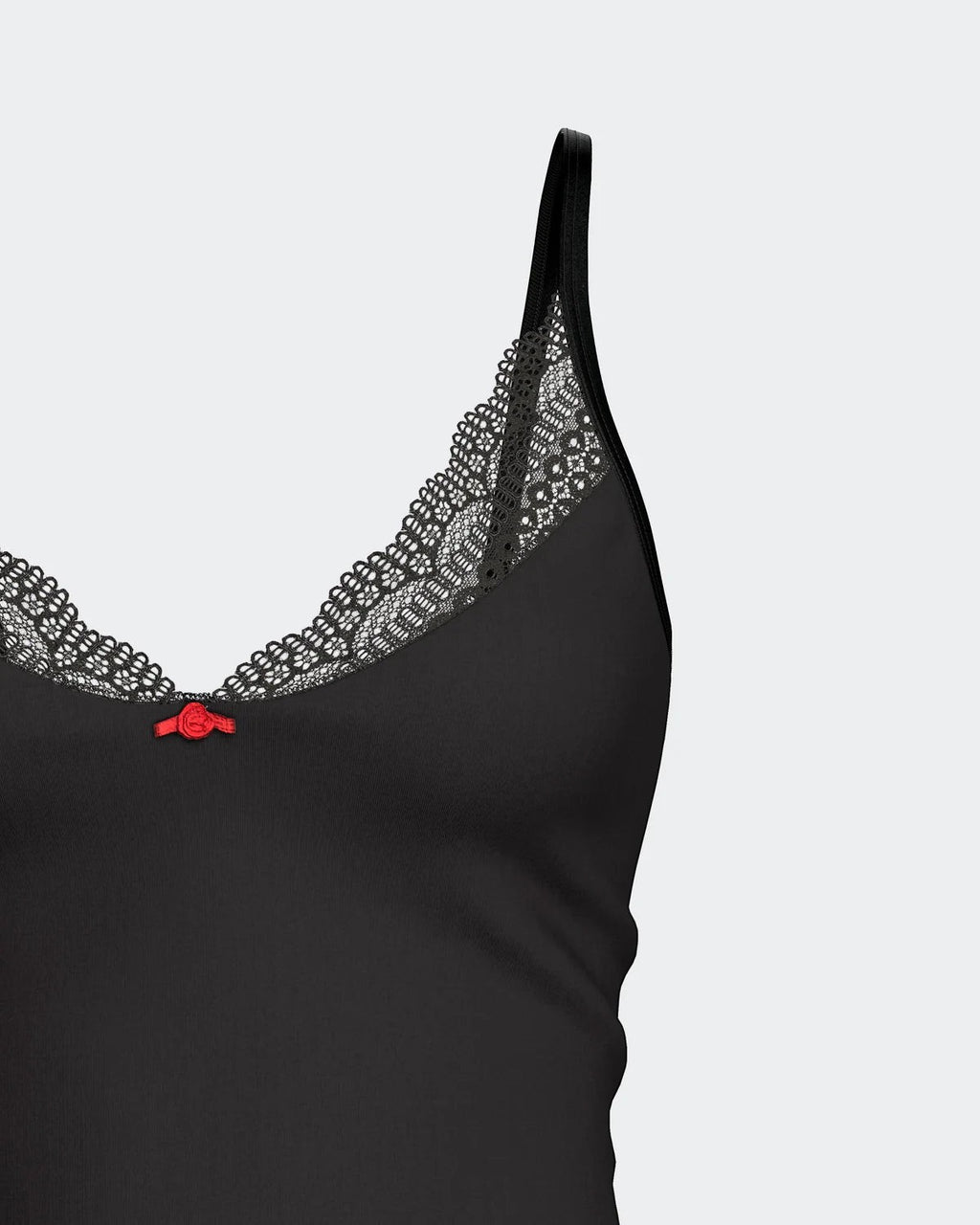 Maison Sarava black camisole with lace trim and red bow detail, made from TENCEL™ Lyocell.
