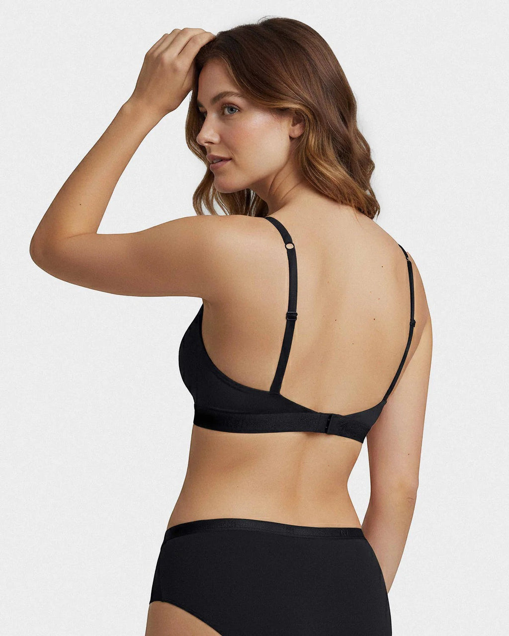 Maison Sarava black Lyocell triangular bra with adjustable straps and hook-and-eye closure.