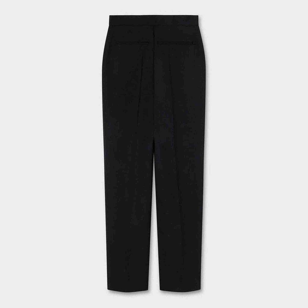 Maison Sarava black tailored wide leg trousers with high waist and pleats.