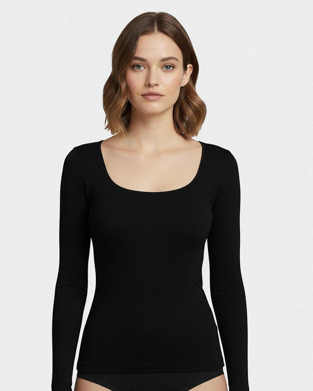 Maison Sarava black long sleeve scoop neck tee made from soft Merino wool and Lyocell blend, ideal for layering.