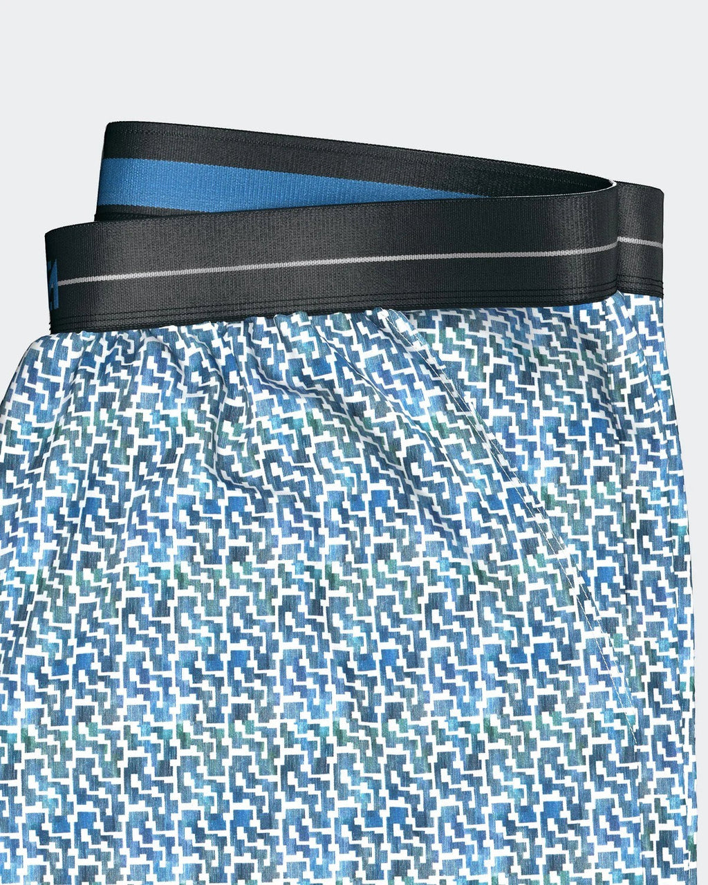 Maison Sarava men's blue geometric print 100% cotton lounge shorts with black elastic waistband.