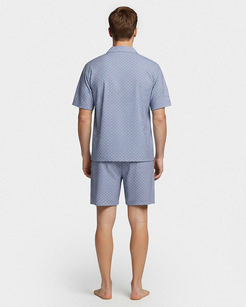 Maison Sarava men's light blue cotton lounge set with white polka dots. Short sleeve shirt and shorts.