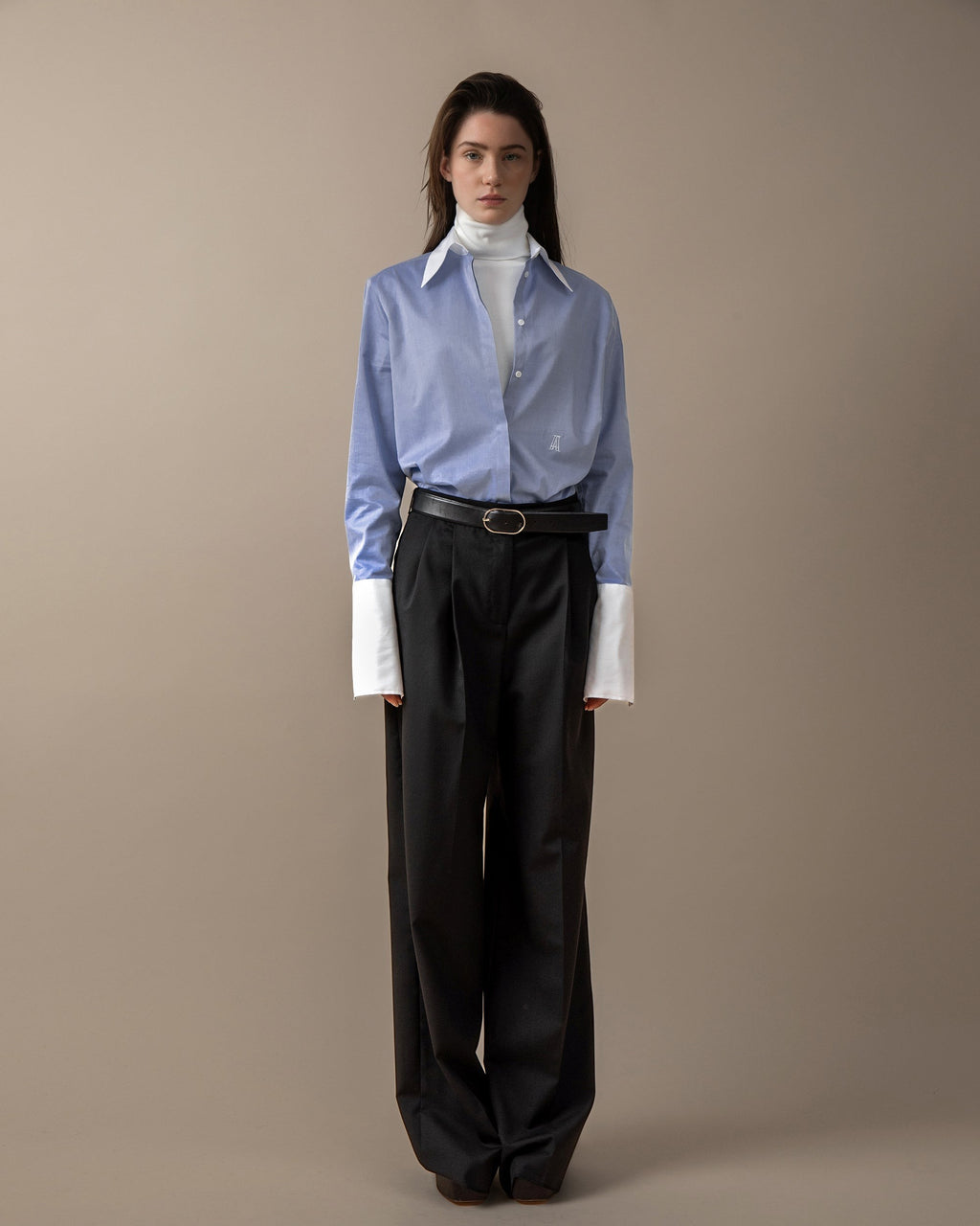 Maison Sarava women's blue striped fitted shirt with white collar and cuffs, hidden buttons, and embroidered logo.