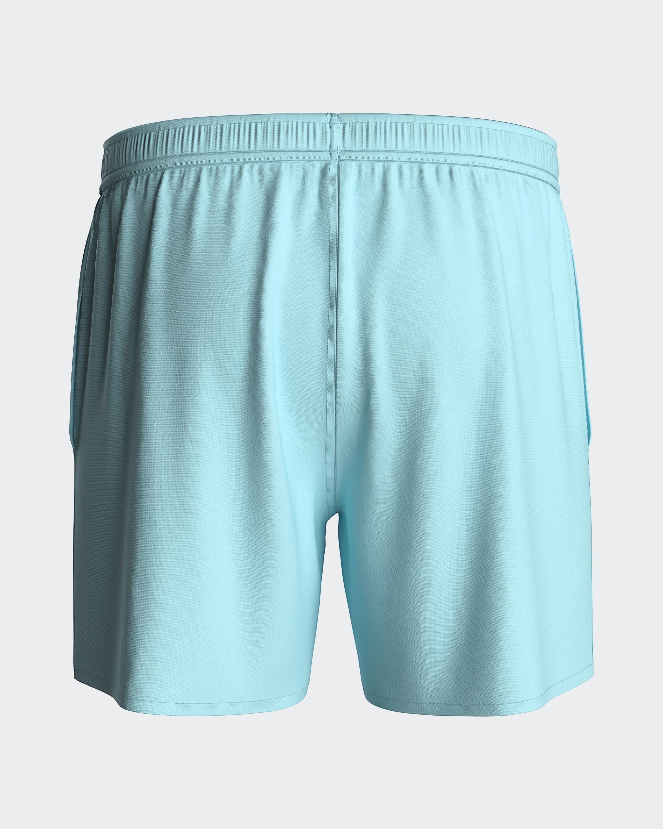 Maison Sarava light blue polyester men's swim shorts with adjustable drawstring waist and side pockets.