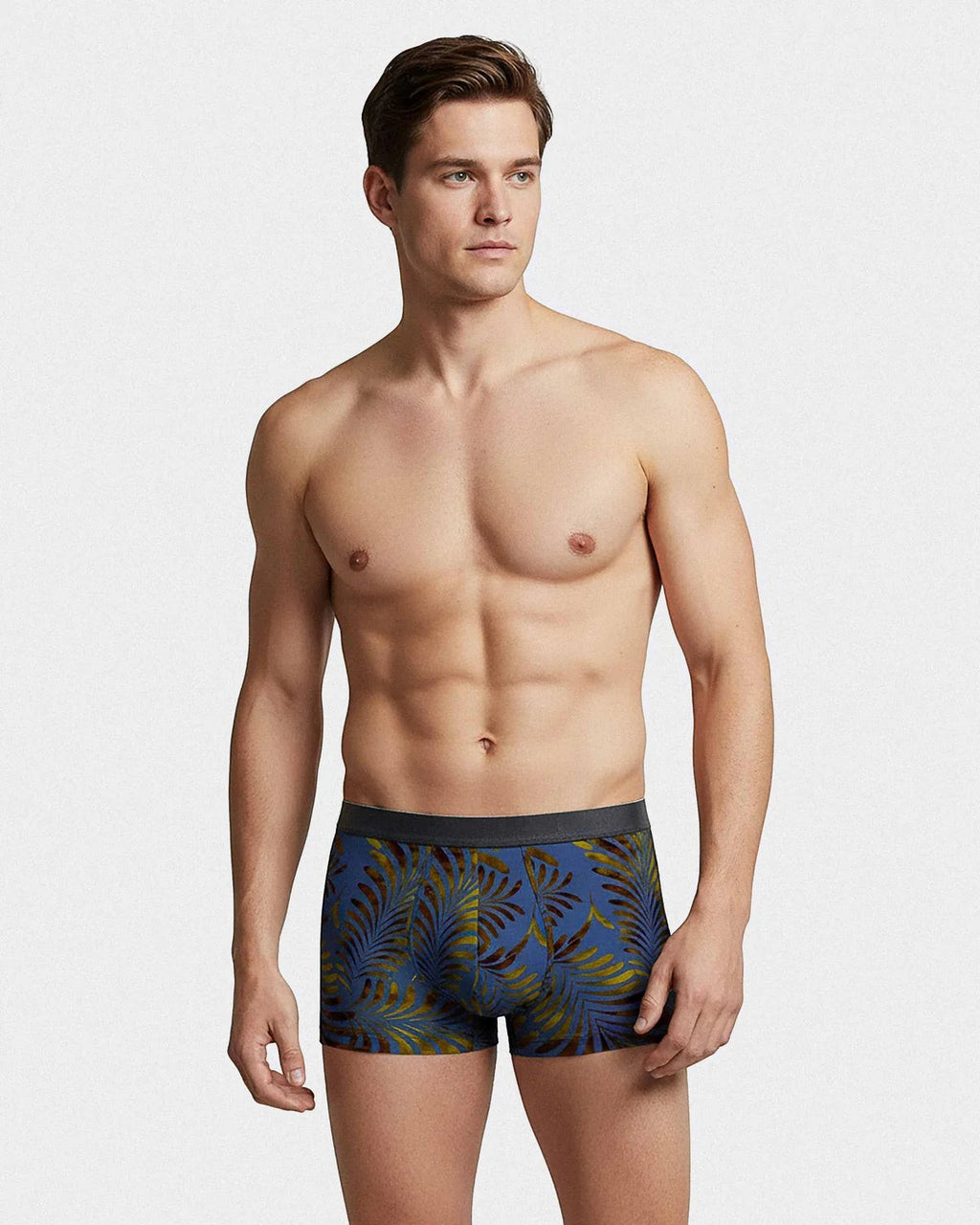 Maison Sarava men's blue boxer briefs with tropical leaf print, made from TENCEL Lyocell.