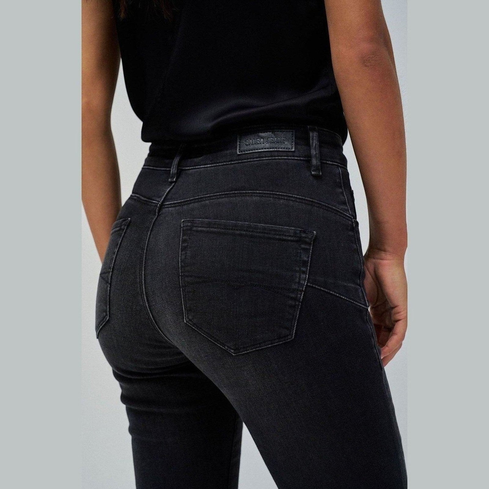 Maison Sarava charcoal wash high waisted flare denim jeans with a flattering silhouette.