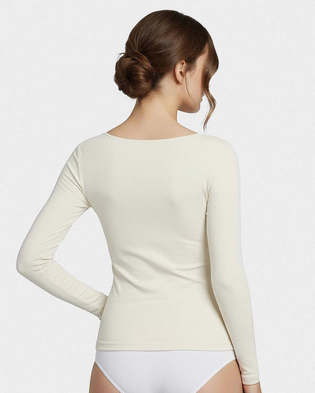 Maison Sarava women's cream long sleeve scoop neck tee made from soft Merino wool and Lyocell blend.