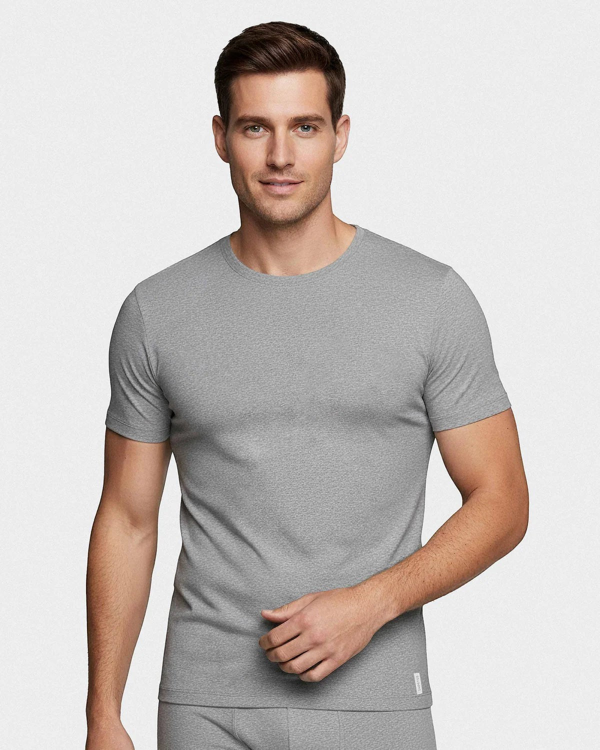 Maison Sarava grey cotton crew neck t-shirt on a man. Short sleeves, classic fit, ideal for everyday wear.