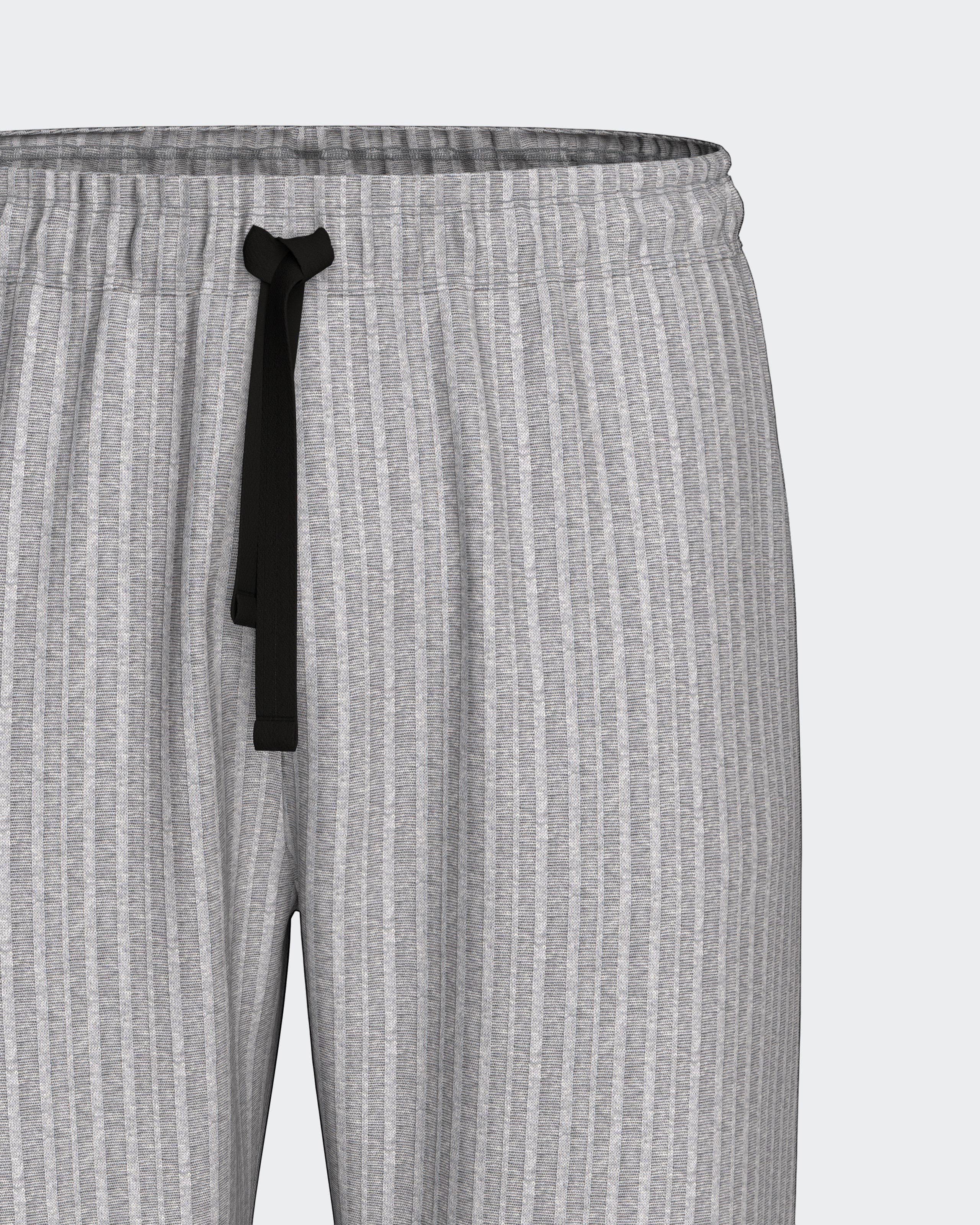 Maison Sarava grey ribbed lounge pants with black drawstring waist. Comfortable, relaxed fit for home wear.