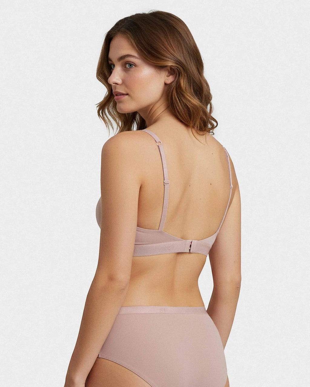 Maison Sarava women's non-wired triangular bra in soft Lyocell, featuring adjustable straps and a comfortable band. Nude pink.