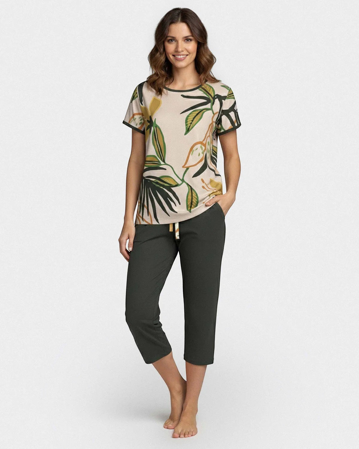 Maison Sarava women's beige lounge set with tropical print short sleeve top and dark green capri pants. Made from TENCEL Lyocell.