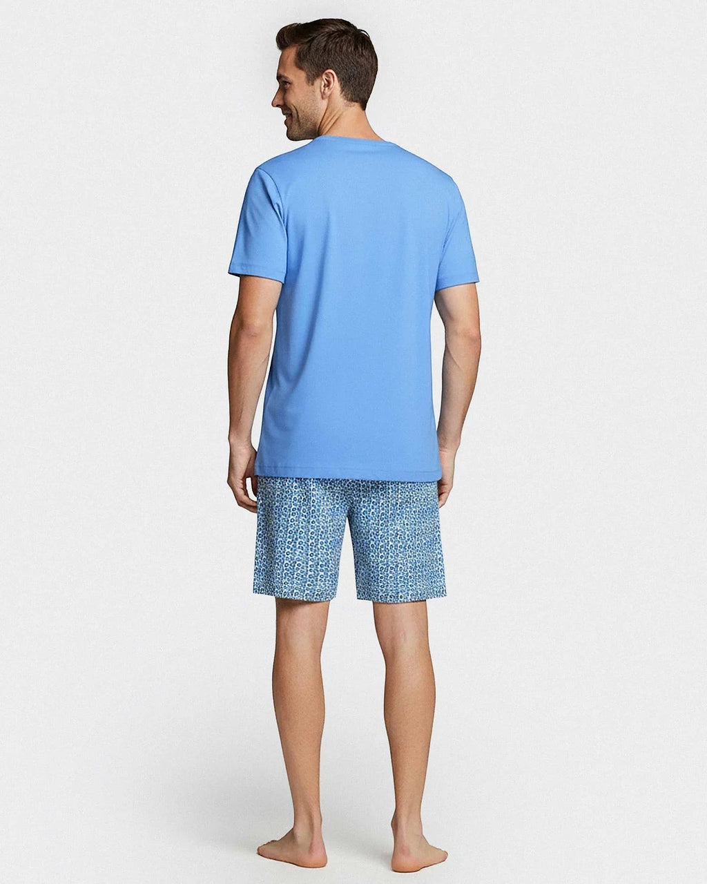 Maison Sarava men's blue 100% cotton short sleeve lounge set with geometric print shorts and two-button placket top.
