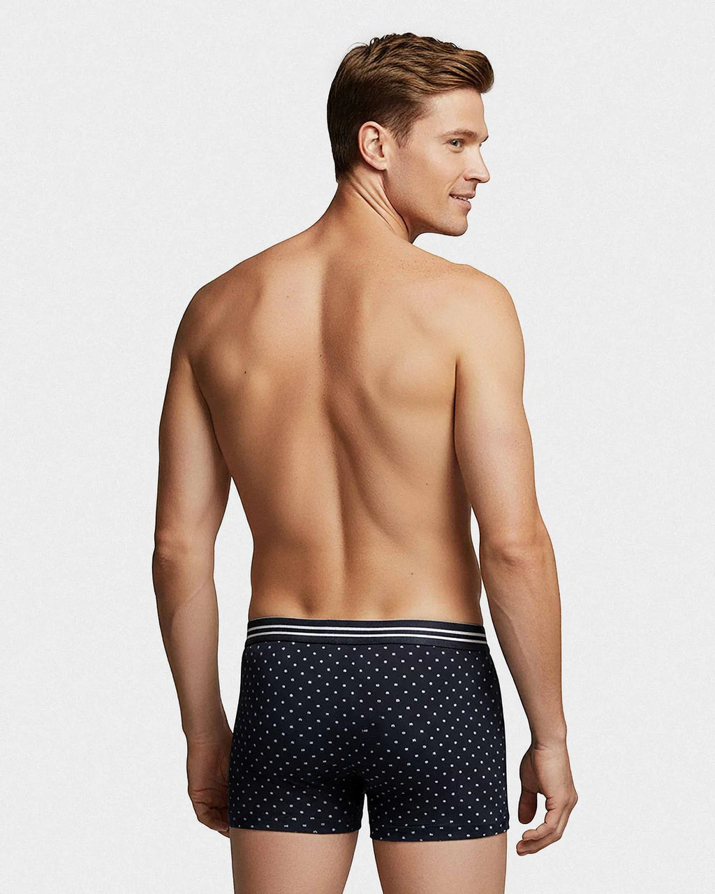 Maison Sarava men's navy cotton boxers with micro logo pattern and striped elastic waistband.