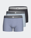 Maison Sarava pack of 3 men's cotton boxers: one blue with micro logo pattern, one light blue, one black. Comfortable elastic waistband.