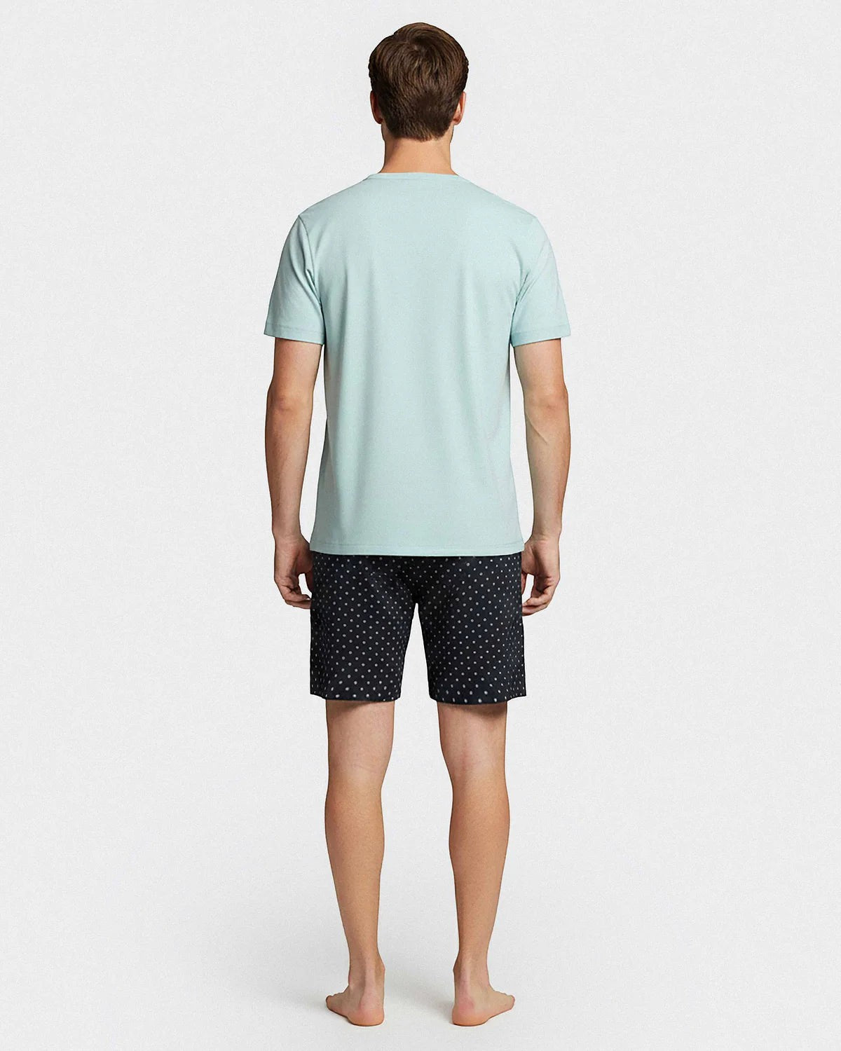 Maison Sarava men's light blue cotton t-shirt and navy micro-logo pattern shorts loungewear set.