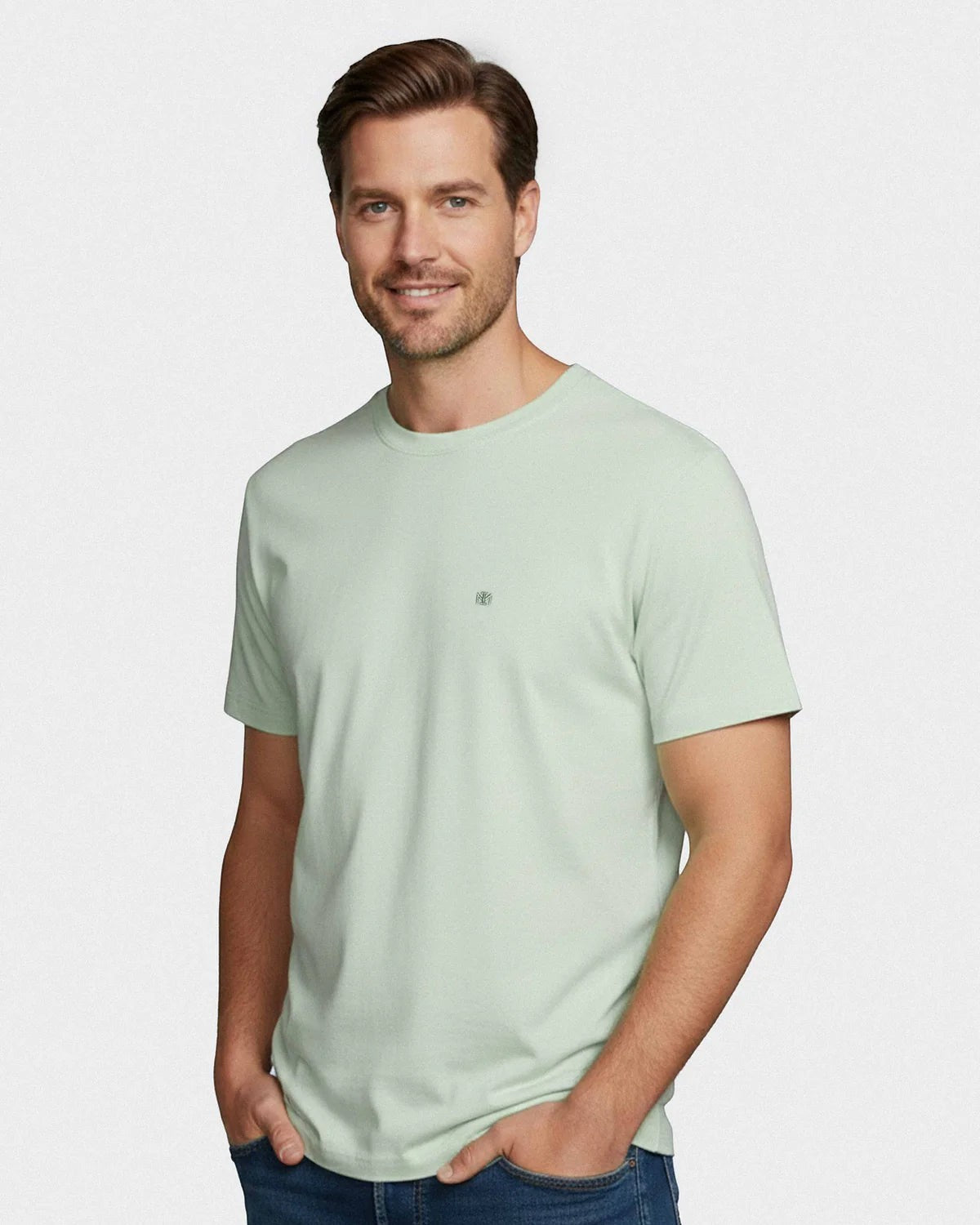 Maison Sarava men's light green cotton t-shirt with round neck and subtle chest embroidery.
