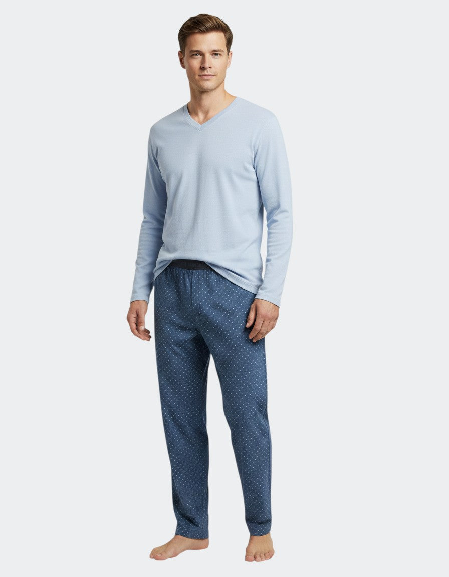 Maison Sarava light blue V-neck long-sleeve top and blue patterned lounge pants with elastic waistband. Cotton and TENCEL Modal blend.