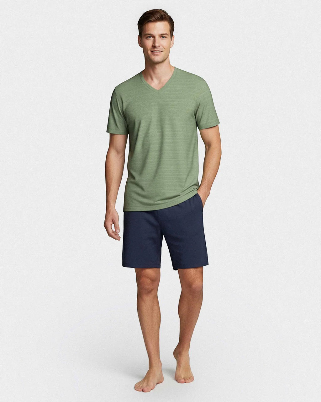 Maison Sarava men's light green V-neck t-shirt with fine line print and navy blue shorts made from TENCEL™ Modal.
