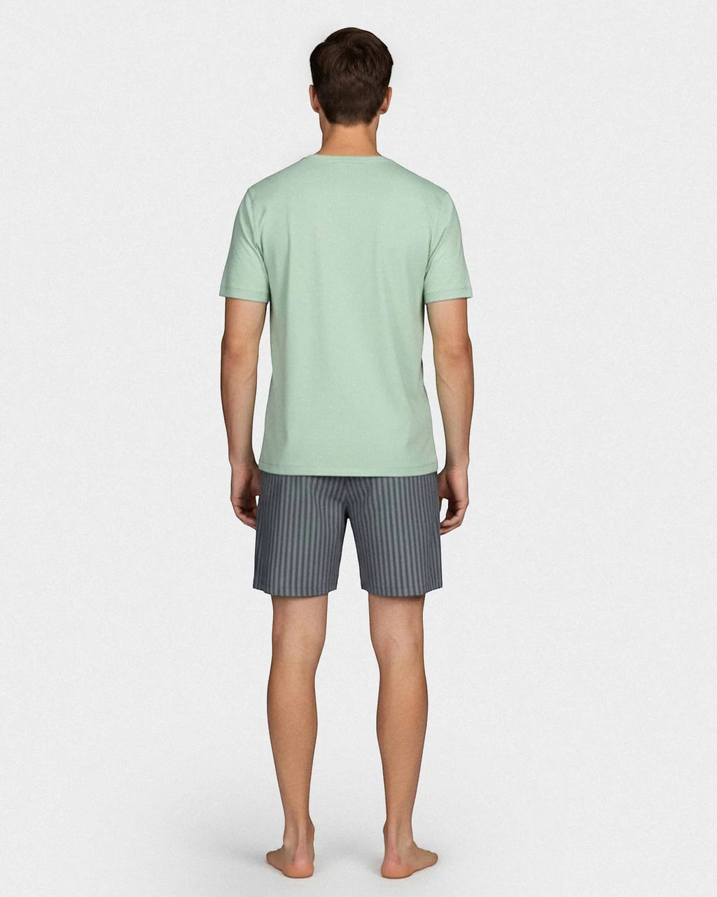 Maison Sarava men's light green short-sleeve lounge top with grey striped shorts made from TENCEL Modal and cotton.