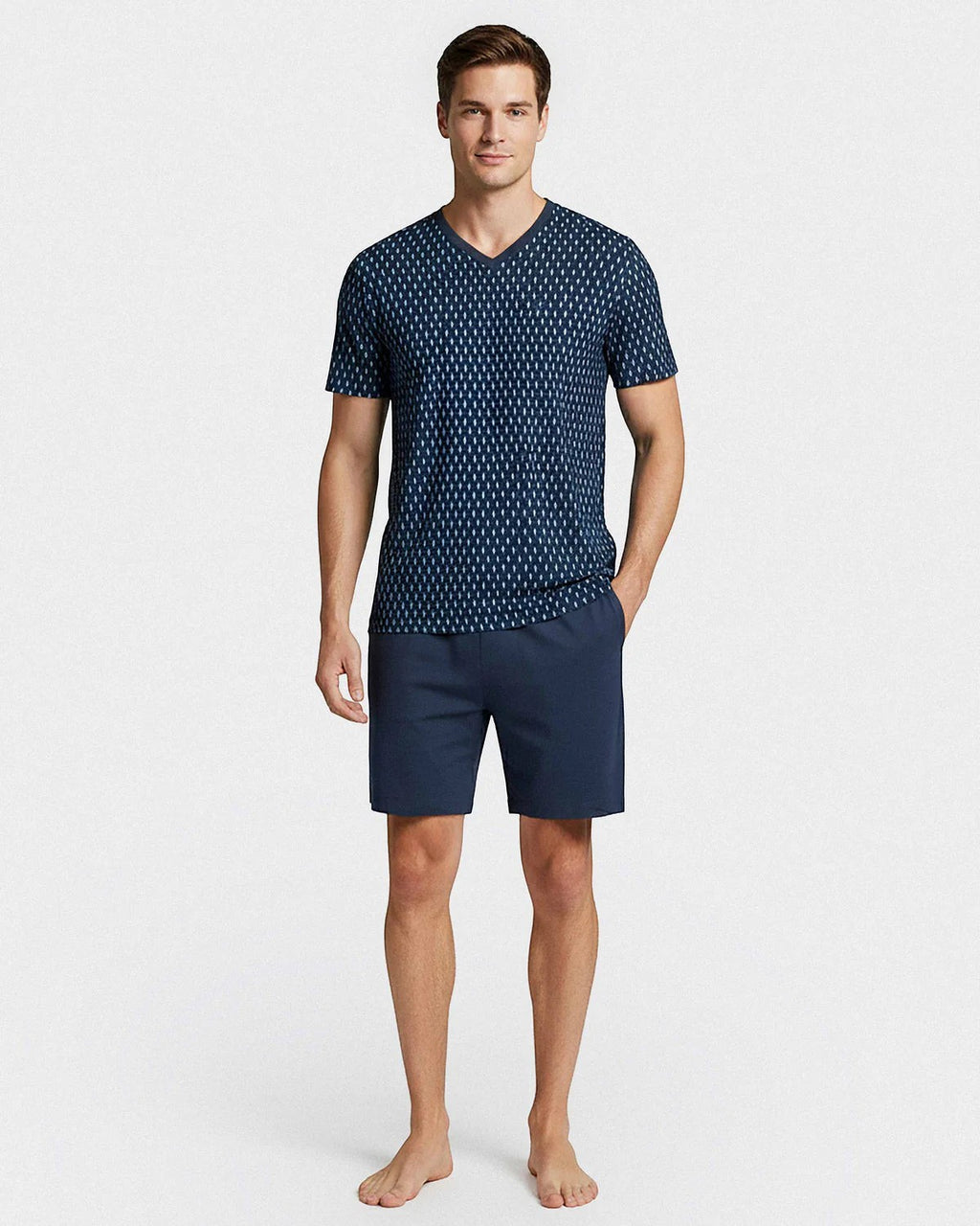 Maison Sarava men's navy blue cotton short sleeve lounge set with a geometric pattern and matching navy shorts.