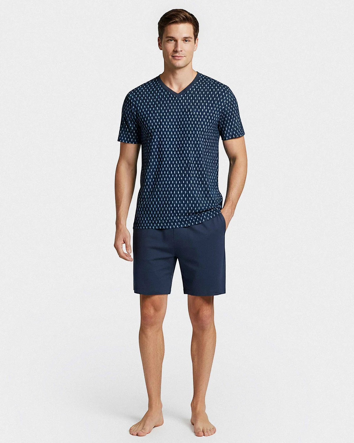 Maison Sarava men's navy blue cotton short sleeve lounge set with a geometric pattern and matching navy shorts.