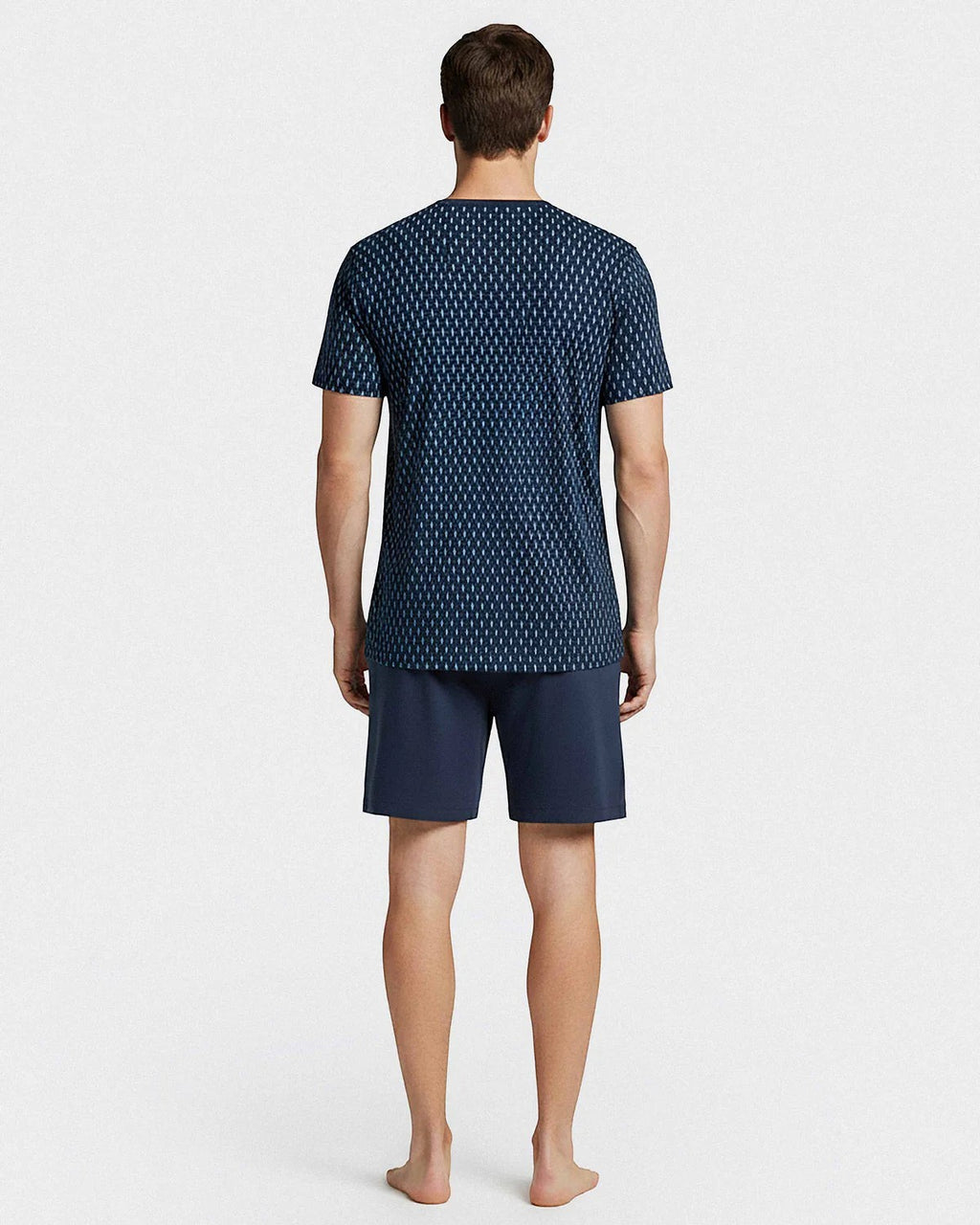 Maison Sarava men's navy blue cotton short sleeve lounge set with a geometric pattern on the t-shirt and solid navy shorts.