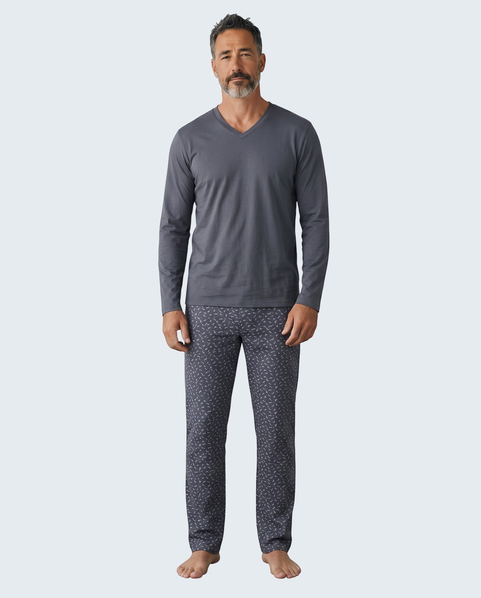 Maison Sarava men's dark grey long sleeve V-neck pajama top with patterned pants.