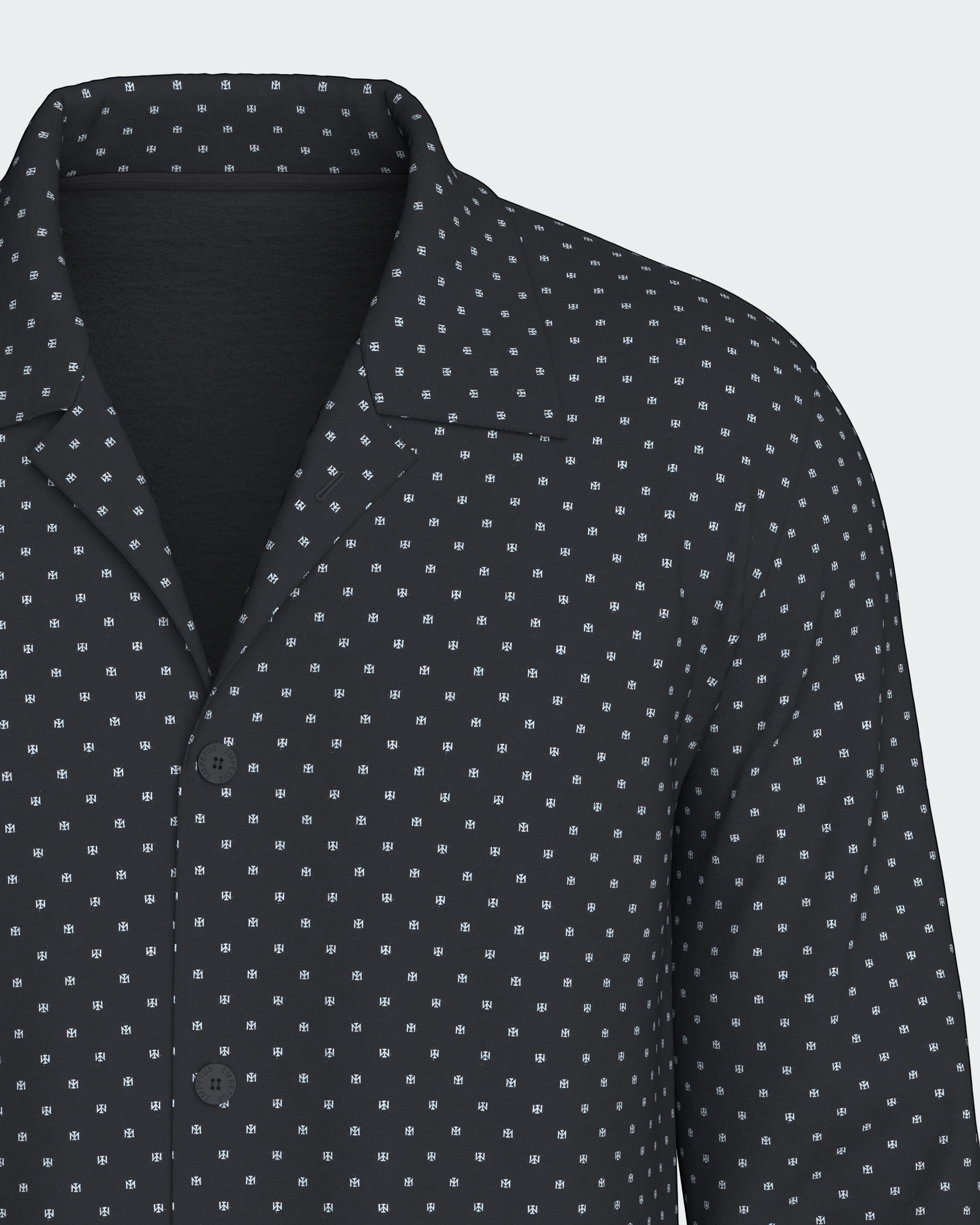 Maison Sarava men's black long sleeve pyjama top with subtle white micro-print pattern, button-down front, and organic cotton.