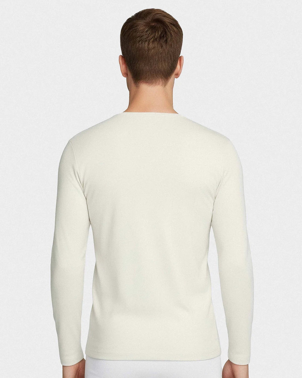 Maison Sarava men's cream long-sleeved V-neck t-shirt made from premium Merino wool and Lyocell for thermal regulation and breathability.