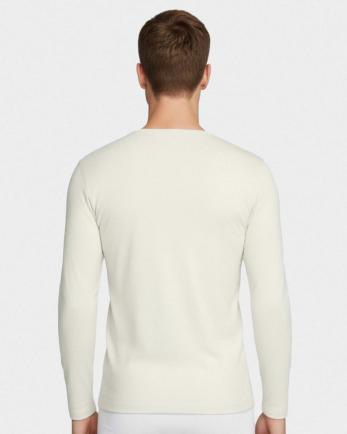 Maison Sarava men's cream long-sleeved V-neck t-shirt made from premium Merino wool and Lyocell for thermal regulation and breathability.