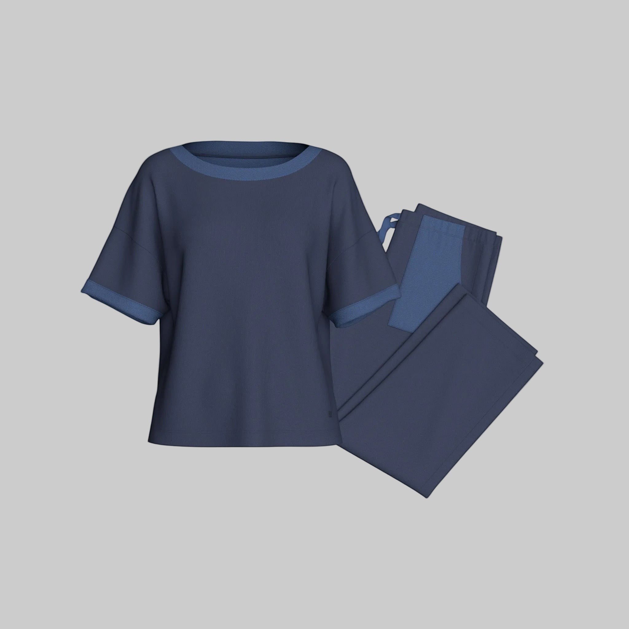 Maison Sarava women's navy blue lyocell cotton short sleeve lounge set with contrasting trim on neckline and sleeves.