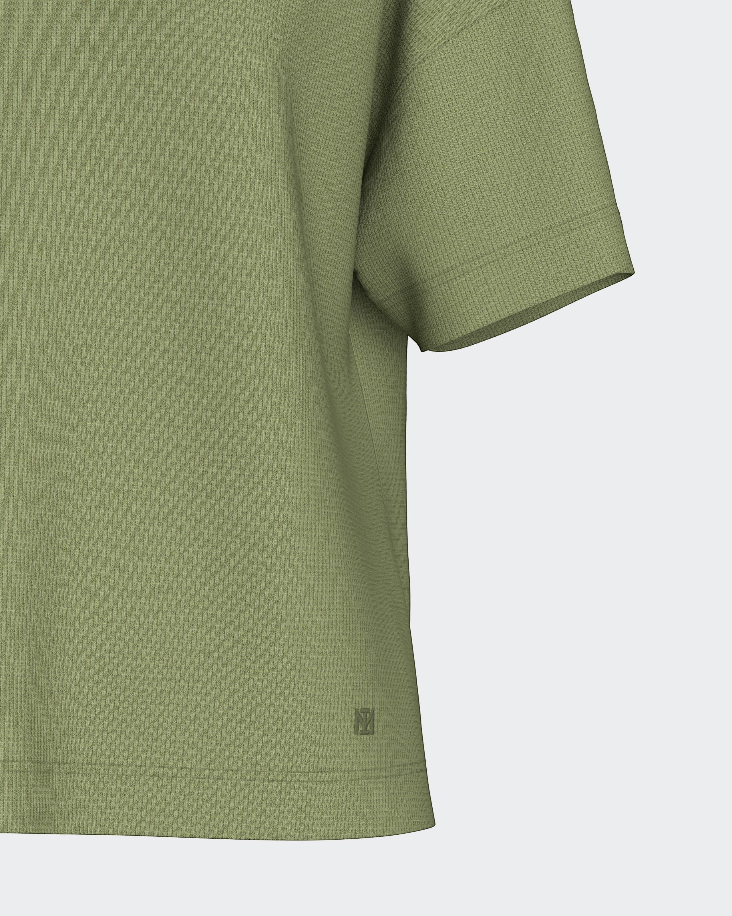 Maison Sarava women's relaxed fit olive green textured knit short-sleeve top made of TENCEL™ Modal and elastane.