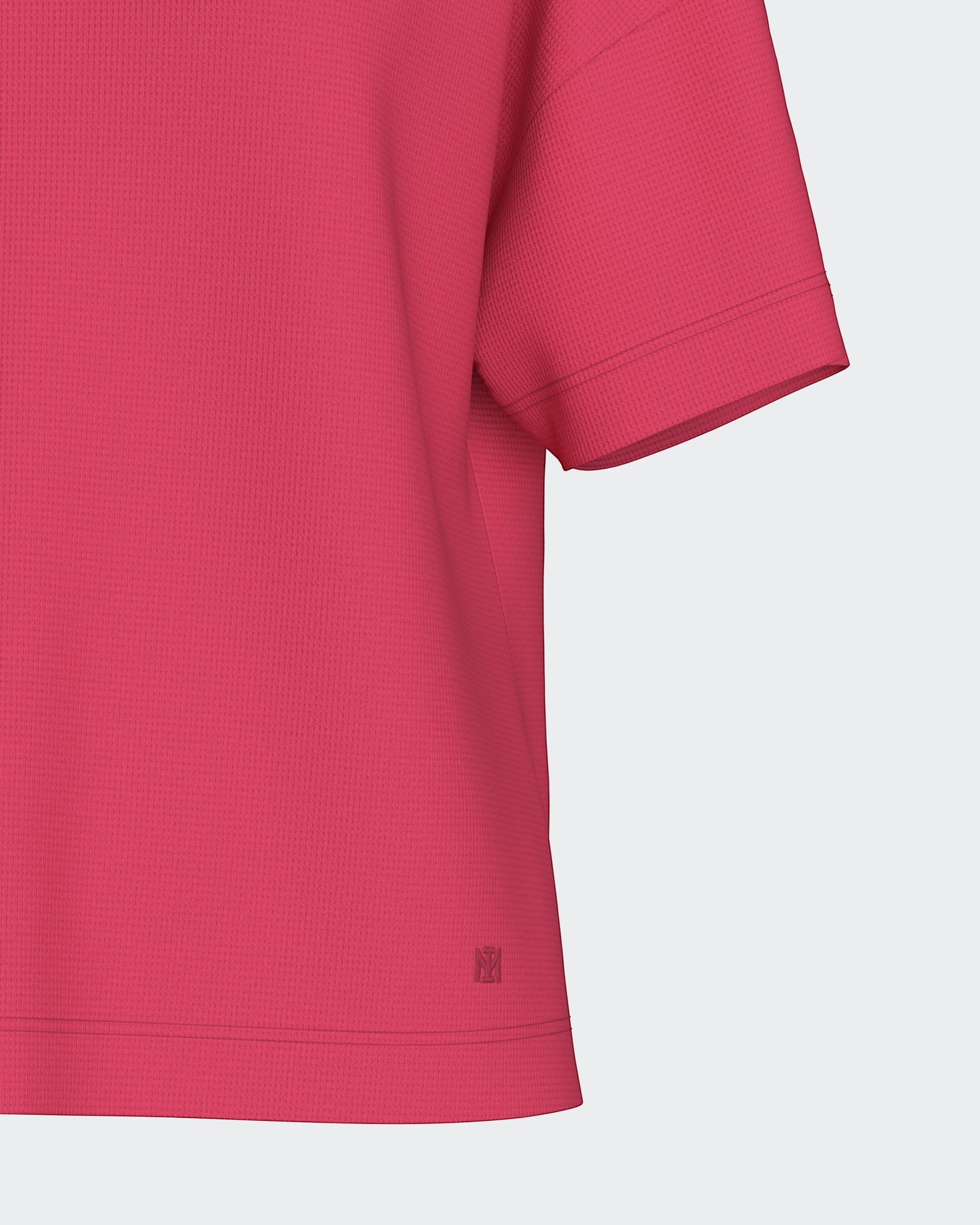 Maison Sarava women's relaxed fit pink textured knit TENCEL™ Modal short-sleeved top with subtle logo detail.
