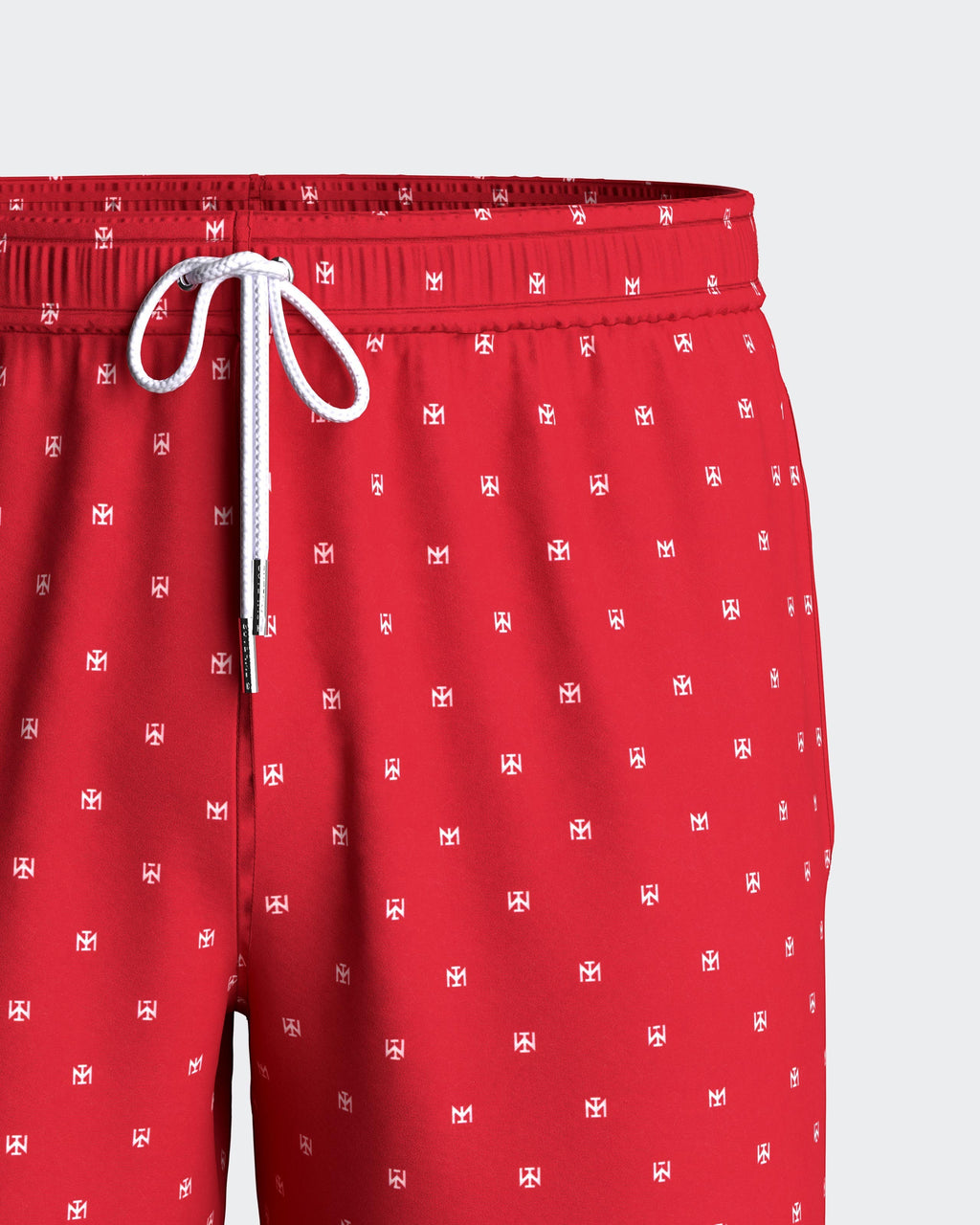 Maison Sarava red micro-pattern swim trunks with white Impetus logo, drawstring waist, side pockets, and inner mesh lining.