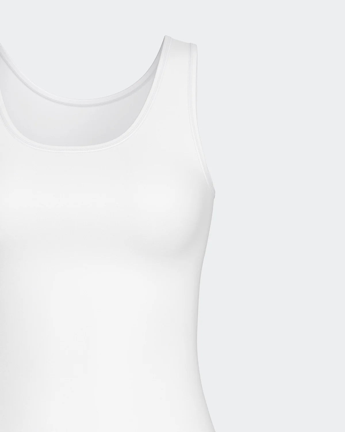 Maison Sarava white cotton and viscose blend women's tank top with Outlast technology for temperature regulation.