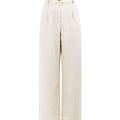 Maison Sarava white tencel wide-leg trousers with front pleats and elastic waistband.