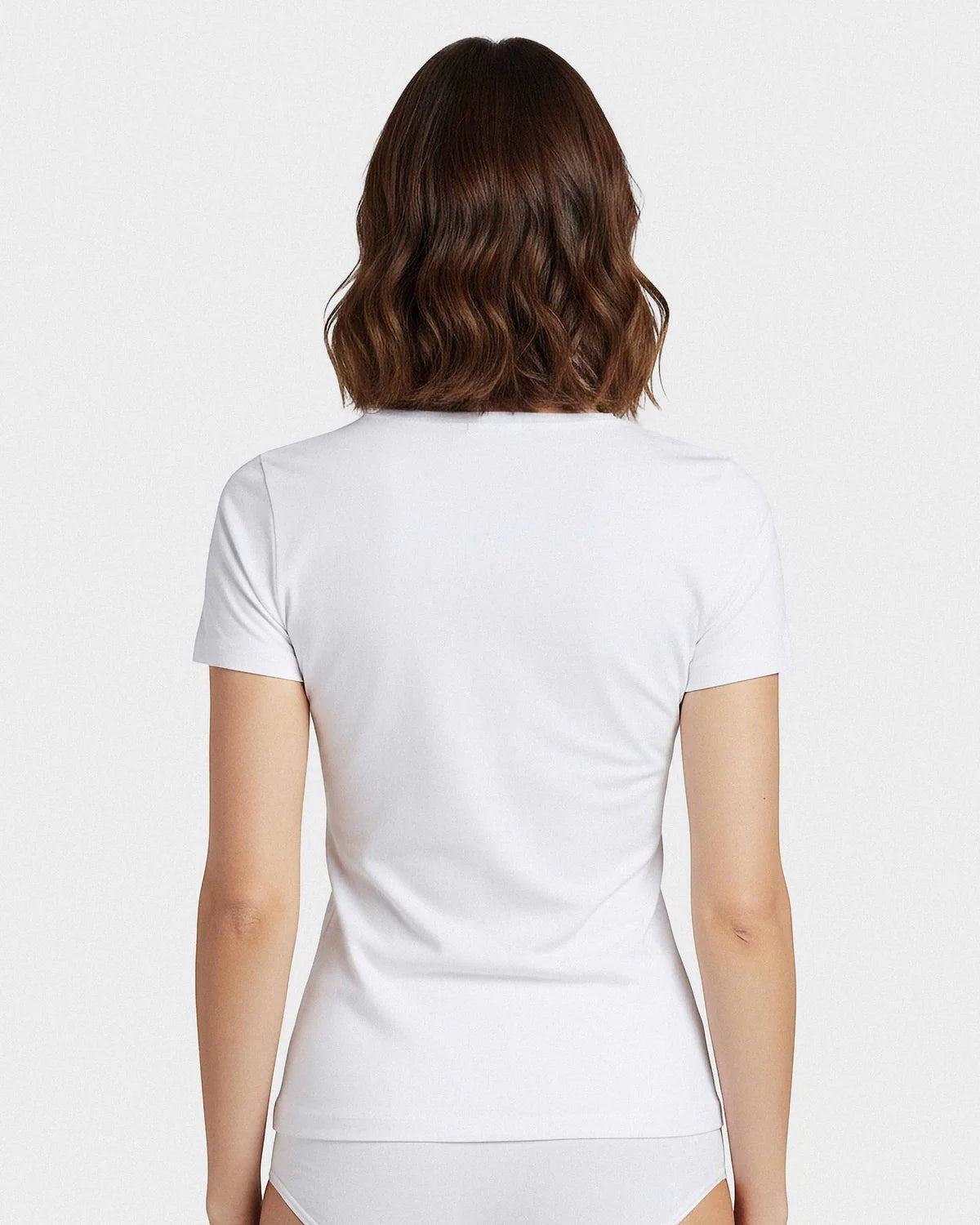 Maison Sarava white V-neck t-shirt made from a cotton and viscose blend with Outlast® technology for temperature regulation.