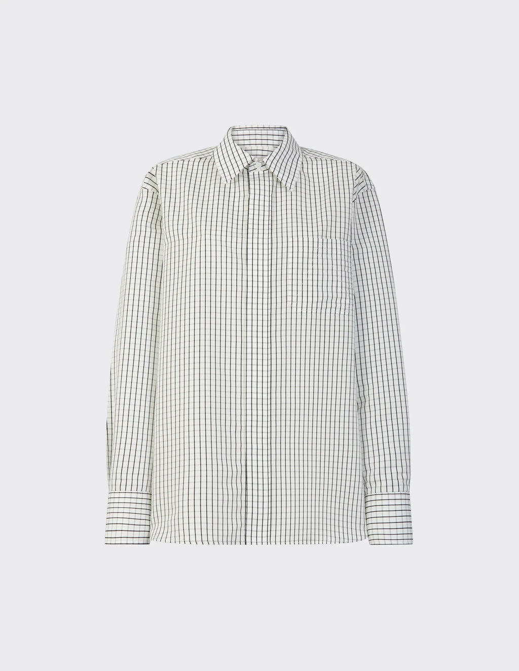 Maison Sarava women's oversized white shirt with a black check pattern, pointed collar, and button cuffs.